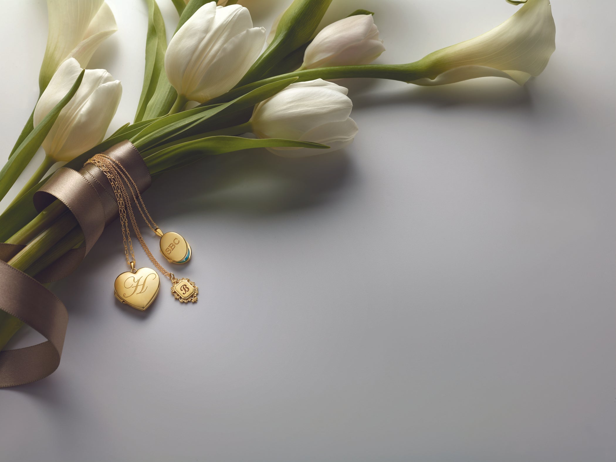 LOCKETS BY DESIGN - DesignJewellers & Diamonds